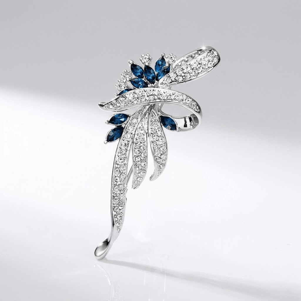 Elegant Sapphire Swirl Brooch